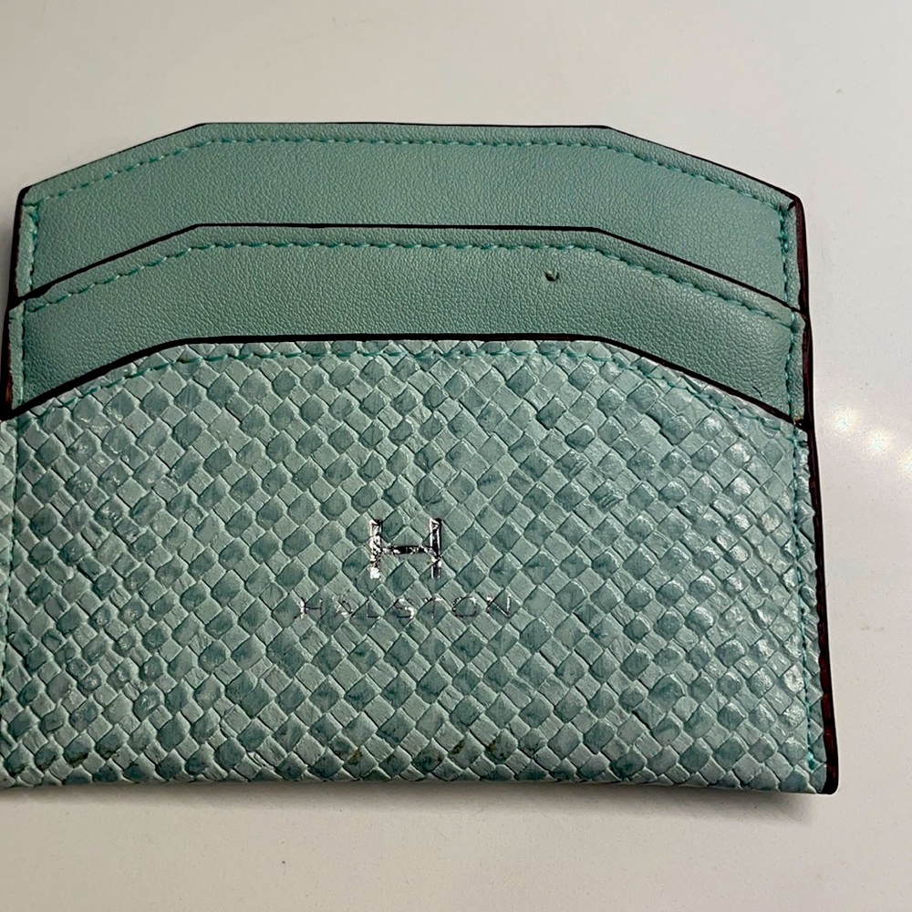 Halston slim card wallet in mint green.